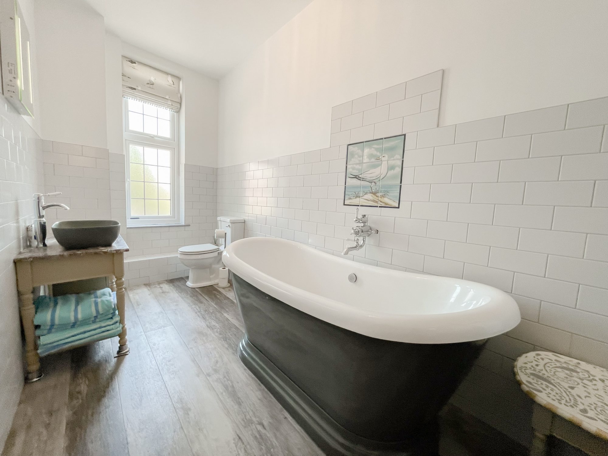 Couple relaxing together at home in their rented property.